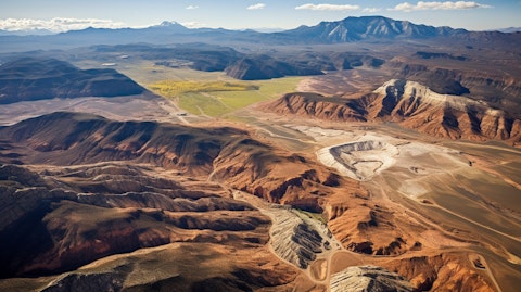 Aerial view of a Nevada mountain range, a reminder of the active mining sites of the company.