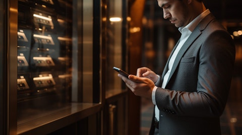 A customer using the bank's mobile banking service, enabling them to access their money from anywhere.