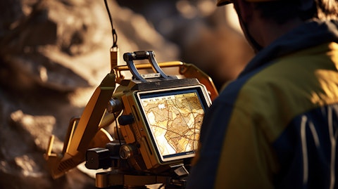 A close-up of a technician using advanced geological-surveying equipment, evaluating a gold deposit.