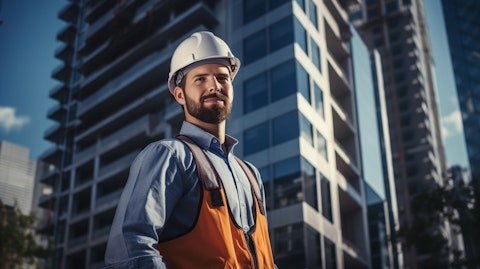 An engineer standing proudly in front of a high-rise building, a symbol of the company's excellence in construction.