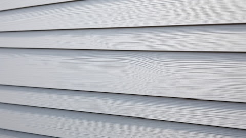 A close-up of a house with its exterior siding made from the company's fiber cement building materials.