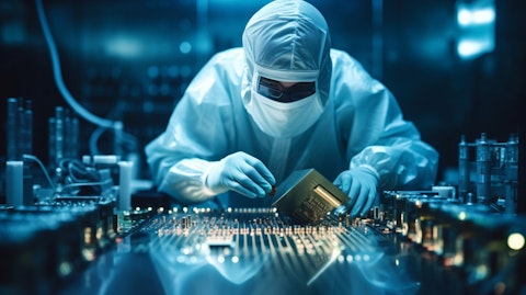 A technician focused on a complex semiconductor chip in their lab.