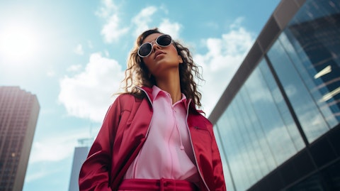 A fashion model wearing a complete look featuring the company's apparel.