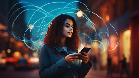 A woman holding her mobile phone, showcasing the wireless voice transmission technology.