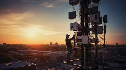 A technician setting up a tower to improve the city’s broadband coverage.