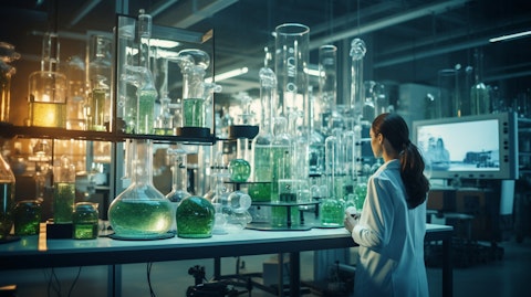 A researcher standing in a modern laboratory, surrounded by scientific equipment.