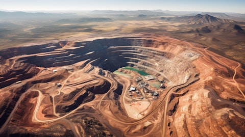 An aerial view of a vast mining project in a remote area of a landscape.