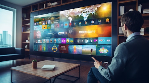 A person at home displaying a vibrant media streaming interface, being rendered on a large flatscreen television.