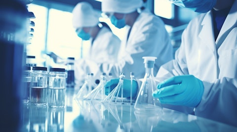 A medical research team in a laboratory, focusing on a bottle containing therapeutic proteins.
