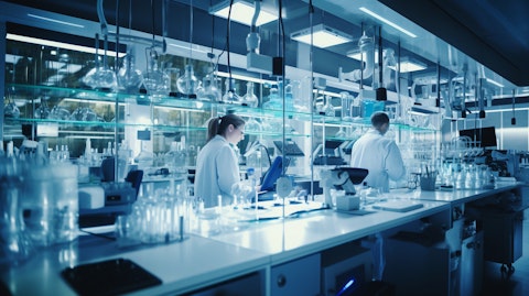 A laboratory setup with technicians in lab coats working in a biotech facility.