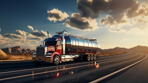 A large tanker truck carrying volatile industrial liquid chemicals, emphasizing the company's transportation capabilities.