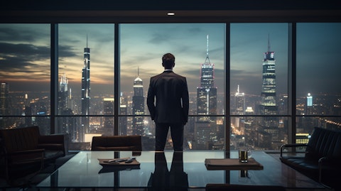 A confident businessperson in a suit, standing in a boardroom illuminated by a window showcasing a skyline of high-rise buildings.