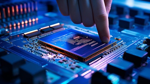 A close up view of mmWave Integrated Circuits with a technician pointing out the intricate components.