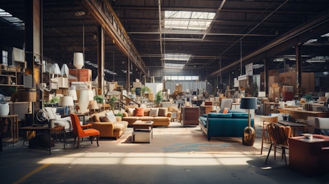 A mid-sized warehouse filled with furniture and home appliances.