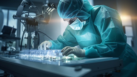 A medical technician assembling a disposable infusion platform.