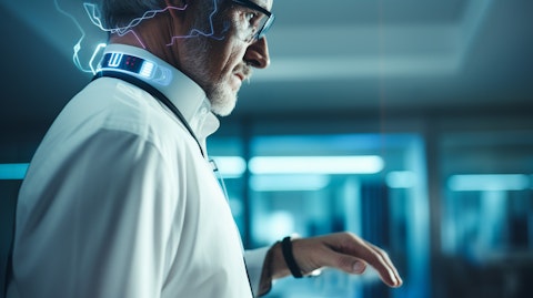 A medical specialist inspecting wearable devices developed by the medical devices company.