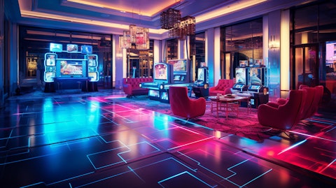 A wide shot of a luxurious hotel with a neon lit gaming floor.