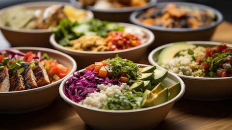A close-up of a variety of restaurant dishes in a fast-casual setting.