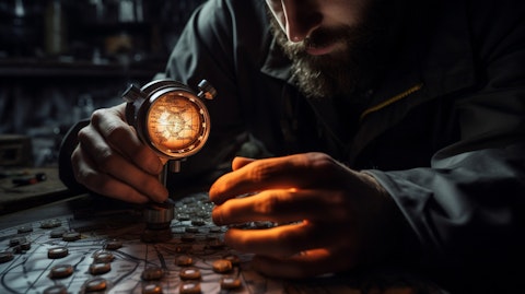 An engineer inspecting one of the company's precision navigation devices.
