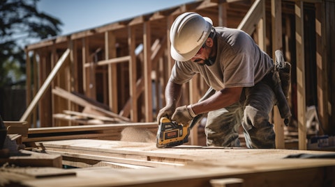 A worker making repairs on a newer home, representing new construction as part of the company's offerings.