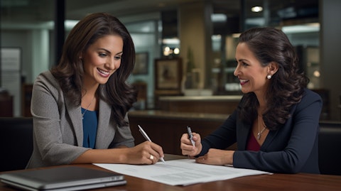 A banking specialist consulting with a customer on the benefits of a certificate of deposit.