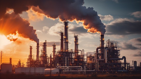A refinery with billowing smokestacks and piping infrastructure, symbolizing the company's production capabilities in ethylene, propylene, and crude butadiene.