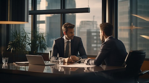 A business manager consulting with a financial advisor in an office setting.