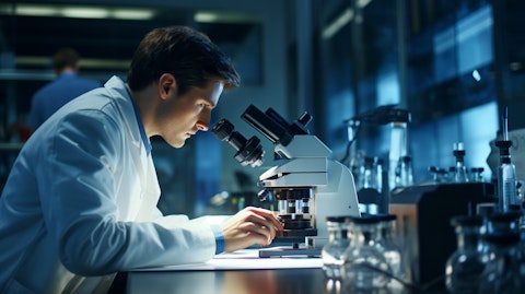 A scientist in a lab coat with a microscope magnifying a sample of a rare disease therapy.
