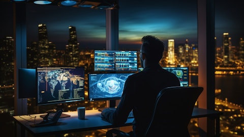 A software engineer in the company's development center working with a software developers kit.