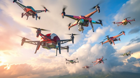 A stock image of a colorful array of unmanned aerial vehicles flying up towards the sky.