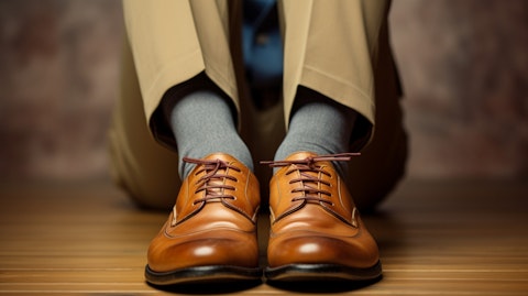 A smiling customer's feet donning the company's latest footwear.