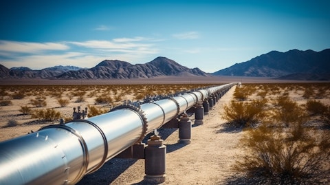 A pipeline stretching through a desert valley, a symbol of the companies transportation infrastructure.