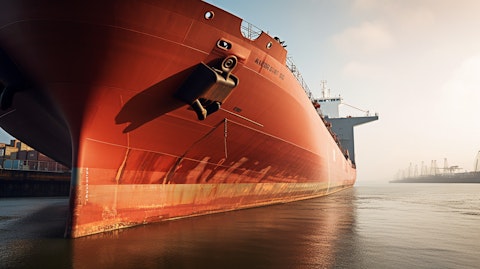A close-up shot of the bow of a large drybulk carrier on the open seas.