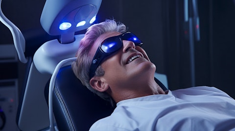 A dentist performing a pain therapy on a patient using a high-tech laser system.