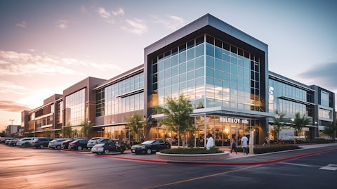 A high-quality exterior shot of a business complex with several enterprise brands and retailers.